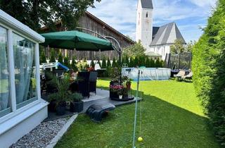 Wohnung kaufen in 83064 Raubling, Attraktive 4-Zimmer-Gartenwohnung mit Doppelgarage