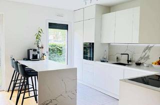 Wohnung kaufen in Franz-Krug-Straße, 61184 Karben, Moderne 4-Zimmer-Gartenwohnung mit 165 m² Garten und hochwertiger Ausstattung