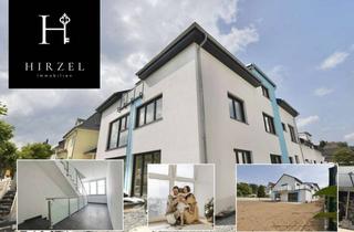 Wohnung kaufen in 64546 Mörfelden-Walldorf, Erstbezug: Exklusive Dachgeschosswohnung mit Tiefgaragenstellplatz