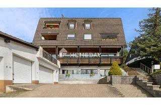 Wohnung kaufen in 63584 Gründau, Gründau - Stilvolle Maisonette-Wohnung mit 2 Balkonen, 2 Terrassen, Kamin und möglicher Gartennutzung