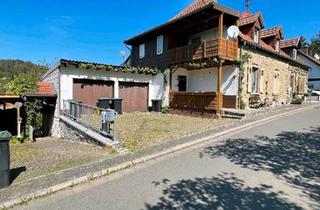 Doppelhaushälfte kaufen in 67749 Offenbach-Hundheim, Offenbach-Hundheim - Doppelhaushälfte mit 3 Vermieteten Wohnungen+Garagen