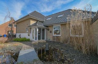 Einfamilienhaus kaufen in 26215 Wiefelstede, Wiefelstede - 6551 - Familienidylle - Stilvolles Einfamilienhaus mit liebevollem Garten in ruhiger Umgebung