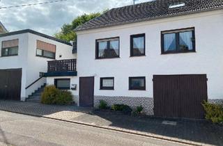 Einfamilienhaus kaufen in 54441 Ayl, Ayl - Einfamilienhaus mit Nebengebäude und großen Garagen in Ayl