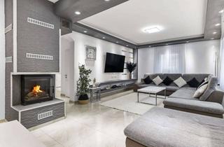 Einfamilienhaus kaufen in 76297 Stutensee, umfangreich modernisiertes Einfamilienhaus - Perfekt für Ihre Familie im Herzen von Friedrichstal