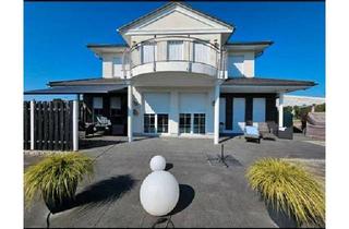 Villa kaufen in 25746 Heide, Heide - Villa exklusiv mit Baugrundstück in Heide
