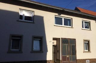 Haus kaufen in 76661 Philippsburg, Philippsburg - Geräumiges Reihenmittelhaus mit großem Stall und Garten