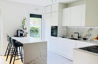 Wohnung kaufen in 61184 Karben, Karben - Moderne 4-Zimmer-Gartenwohnung mit 165 m² Garten in Karben