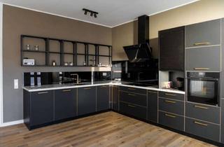 Wohnung kaufen in 21224 Rosengarten, Stilvoll wohnen in Klecken – Erdgeschosswohnung mit exklusiver Küche und Terrasse