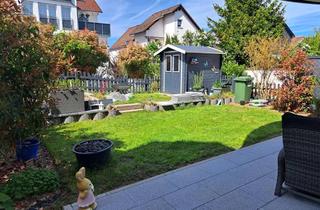 Wohnung kaufen in 63110 Rodgau, Stilvolle, gepflegte 3-Zimmer-Erdgeschosswohnung mit Garten