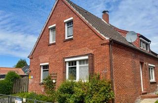 Einfamilienhaus kaufen in 26529 Wirdum, Modernisiertes Einfamilienhaus mit Carport und hübschem Garten