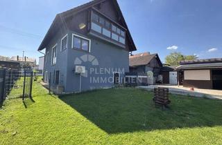 Haus kaufen in 74632 Neuenstein, Modernes Raumwunder mit Wohnmobilgarage und Outdoor-Küche