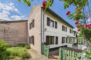 Einfamilienhaus kaufen in 52379 Langerwehe, Einfamilienhaus mit Entwicklungspotential in ruhiger Lage von Langerwehe-Schlich