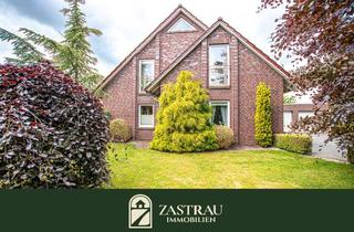 Einfamilienhaus kaufen in 26532 Großheide, Privatsphäre pur: Exklusives Einfamilienhaus mit Traumgarten in Großheide