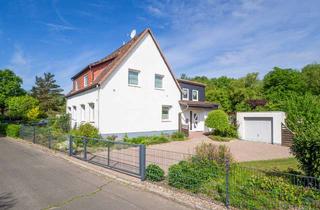 Doppelhaushälfte kaufen in 29525 Uelzen, Schöne und modernisierte Doppelhaushälfte mit Garage und großem Grundstück in Uelzen