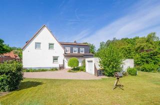 Doppelhaushälfte kaufen in 29525 Uelzen, Schöne und modernisierte Doppelhaushälfte mit Garage und großem Grundstück in Uelzen