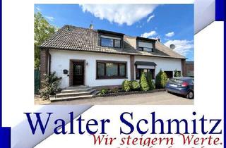 Doppelhaushälfte kaufen in 41748 Viersen, Zwei Doppelhaushälften mit 3 Garagen und Werkstatt - eine wird frei, eine ist solide vermiete