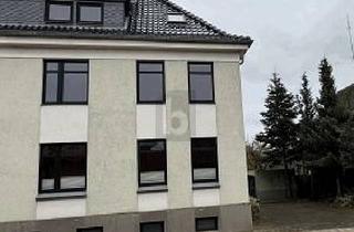 Doppelhaushälfte kaufen in 19386 Lübz, Lübz - FAMILIENIDYLLE MIT GARTEN UND AUSBAURESERVE!