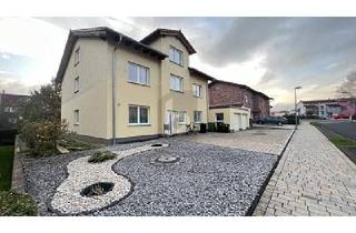 Mehrfamilienhaus kaufen in 34225 Baunatal, MODERNES MEHRFAMILIENJUWEL MIT AUSBAUPOTENZIAL
