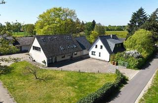 Haus kaufen in 49419 Wagenfeld, Wagenfeld - Zwei auf einen Streich - hier ist Mehrgenerationenwohnen kinderleicht!