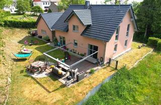 Einfamilienhaus kaufen in 54673 Plascheid, Plascheid - Hochwertiges Einfamilienhaus in massiver Bauweise mit großem Grundstück und durchdachtem Wohnkonzept