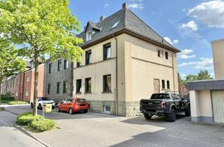 Doppelhaushälfte kaufen in 59302 Oelde, Oelde - Modernisierte Doppelhaushälfte mit großem Garten und flexiblem Nutzungskonzept in zentraler Lage von Oelde