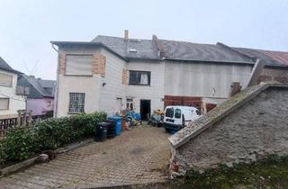 Haus kaufen in 35789 Weilmünster, Weilmünster - Stark renovierungsbedürftige Haus mit Garage und Scheune