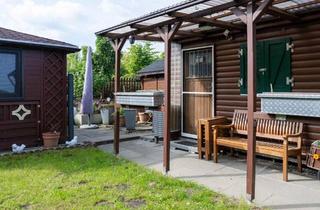 Haus kaufen in 59348 Lüdinghausen, Lüdinghausen - Gemütliche Campinghütte mit Pavillon auf Dauerstellplatz