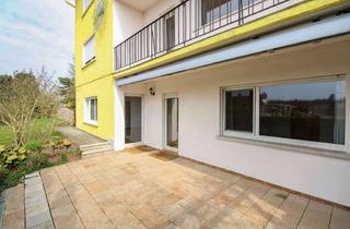 Wohnung kaufen in 61231 Bad Nauheim, Nur wenige Schritte ins Grüne: Erdgeschosswohnung mit Garten und Carport