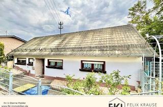 Einfamilienhaus kaufen in 57584 Scheuerfeld, **Familienfreundliches Einfamilienhaus mit Garten und Garage in Scheuerfeld**