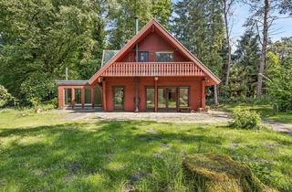 Haus kaufen in 27404 Elsdorf, Wohnen am Waldrand - Holzhaus mit Kamin, Wintergarten und großem Naturgrundstück in Elsdorf