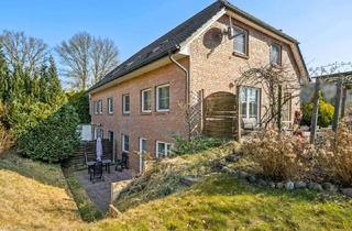 Einfamilienhaus kaufen in 25451 Quickborn, Charmantes Einfamilienhaus mit Einliegerwohnung in familienfreundlicher Lage von Quickborn