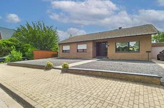 Haus kaufen in 52525 Waldfeucht, Großzügiger Bungalow mit Keller, Kamin und idyllischem Garten in Waldfeucht-Obspringen!