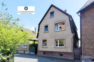 Einfamilienhaus kaufen in 65474 Bischofsheim, Charmantes Einfamilienhaus mit idyllischem Garten – viel Platz für Familien