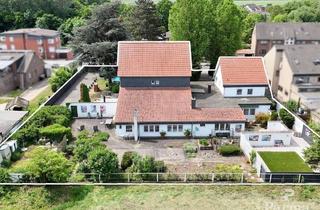 Haus kaufen in 52382 Niederzier, Außergewöhnliches Wohnensemble aus 3 Häusern in Niederzier