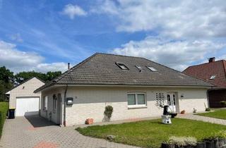 Einfamilienhaus kaufen in 26683 Saterland, Saterland - Walmdachbungalow in ruhiger Siedlungslage von Scharrel