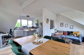 Wohnung kaufen in 61440 Oberursel, Oberursel - Stilvoll sanierte moderne Dachgeschosswohnung in Oberursel