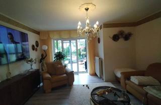 Wohnung kaufen in 57612 Giesenhausen, Dreizimmerwohnung mit Wintergarten