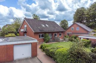 Haus kaufen in 24787 Fockbek, Ruhig gelegenes Zweifamilienhaus mit schön eingewachsenem Grundstück in Fockbek - voll vermietet
