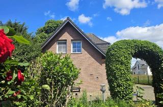 Einfamilienhaus kaufen in 46487 Wesel, Renovierungsbedürftiges Einfamilienhaus auf großem Grundstück in idyllischem Dorf am Niederrhein