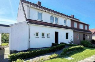 Doppelhaushälfte kaufen in 32429 Minden, Charmante Doppelhaushäfte mit Gartenparadies in ruhiger Lage von Minden-Dützen