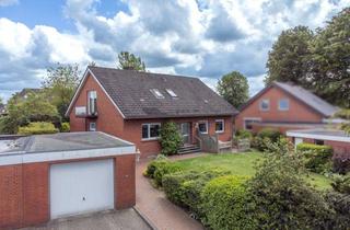 Haus kaufen in 24787 Fockbek, Ruhig gelegenes Zweifamilienhaus mit schön eingewachsenem Grundstück in Fockbek - voll vermietet
