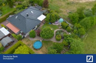 Haus kaufen in 21493 Elmenhorst, Eleganter Winkelbungalow mit Gartenidylle und Ausbaureserve