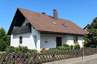Einfamilienhaus kaufen in 63939 Wörth, Gepflegtes Einfamilienhaus mit ELW in ruhiger Ortsrandlage!