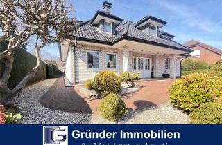 Haus kaufen in 26892 Dörpen, Wohnglück in Dörpen: Exquisiter Walmdachbungalow mit Charme und Komfort