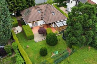 Einfamilienhaus kaufen in 69151 Neckargemünd, Liebevoll gepflegtes Familienhaus mit Wintergarten, Kamin und großem Garten in idyllischer Lage