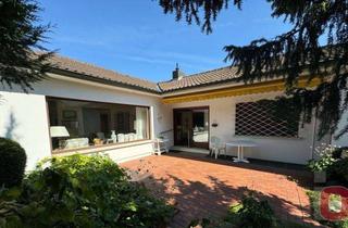 Haus kaufen in 68519 Viernheim, Ihre Chance auf ein einzigartiges Zuhause - Freistehender Winkelbungalow mit sonnigem Garten
