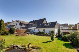 Doppelhaushälfte kaufen in 44227 Dortmund, Dortmund - Doppelhaushälfte mit Anbaupotenzial auf parkähnlichem Grundstück