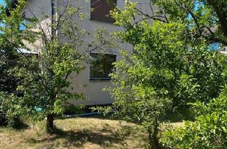 Haus kaufen in 63225 Langen, Langen (Hessen) - Zwei Familienhaus mit großem Garten, bebaubar , ruhig gelegen