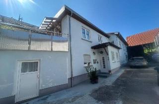 Einfamilienhaus kaufen in 63920 Großheubach, Großheubach - Einfamilienhaus mit Balkon Hof Garage Keller Scheune