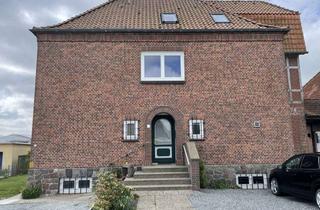 Wohnung kaufen in 23769 Fehmarn, Geräumige 3-Zimmerwohnung im Hochparterre mit Gartennutzung in Burg